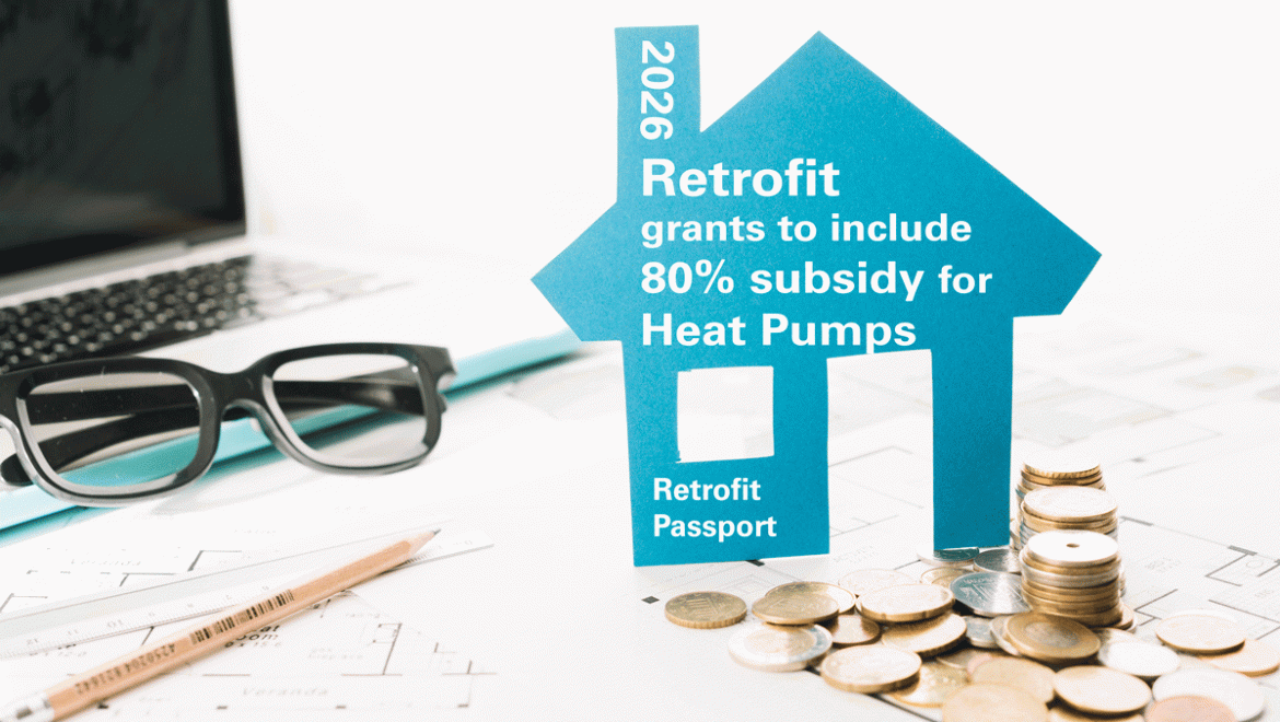 small-house-figurine-coins-laptop