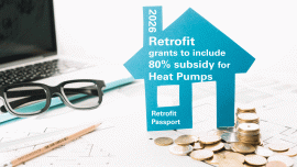 small-house-figurine-coins-laptop